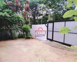 Land with small house in Malabe area
